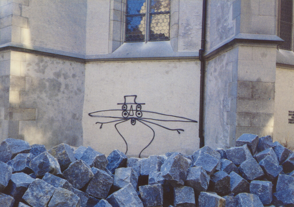 <span class="product-meta">Kunstpostkarte, Postkarte, Grafik, 1982</span> <br /><span class="product-artist">Harald Naegeli</span><span class="breadcrumb-separator">: </span> <br />Spinnenmann